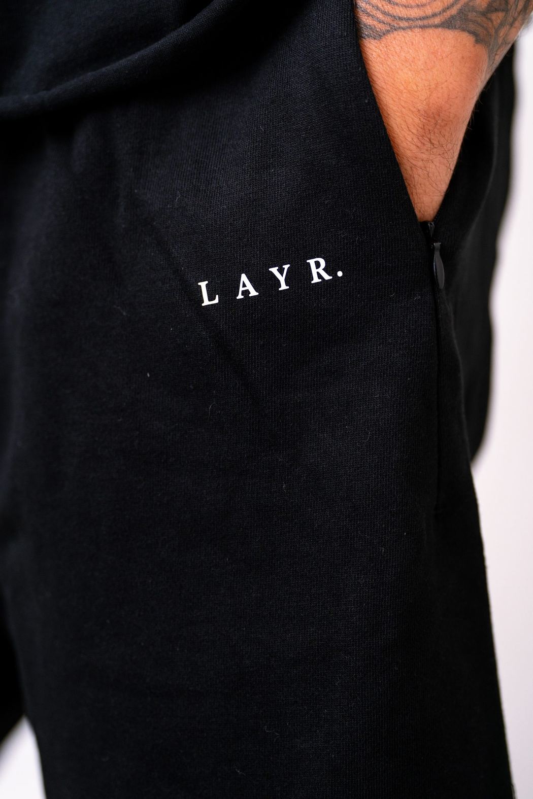 Detail of a logo on a black pocket